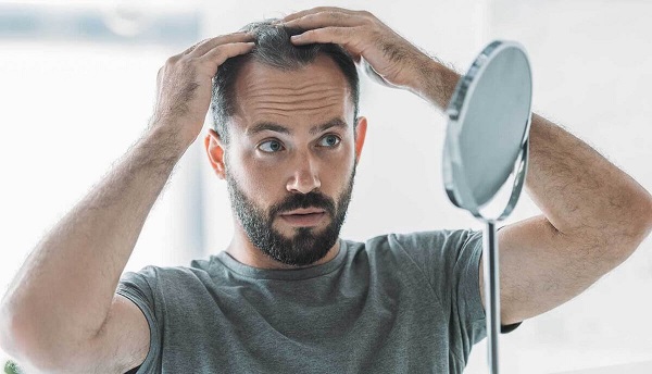 كيفية استخدام بخاخ بعد زراعة الشعر بشكل صحيح