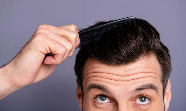 طريقة استخدام الزيوت بعد زراعة الشعر